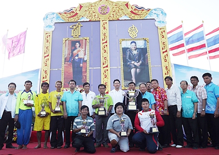 Winners and dignitaries gather for a post-presentation photo.